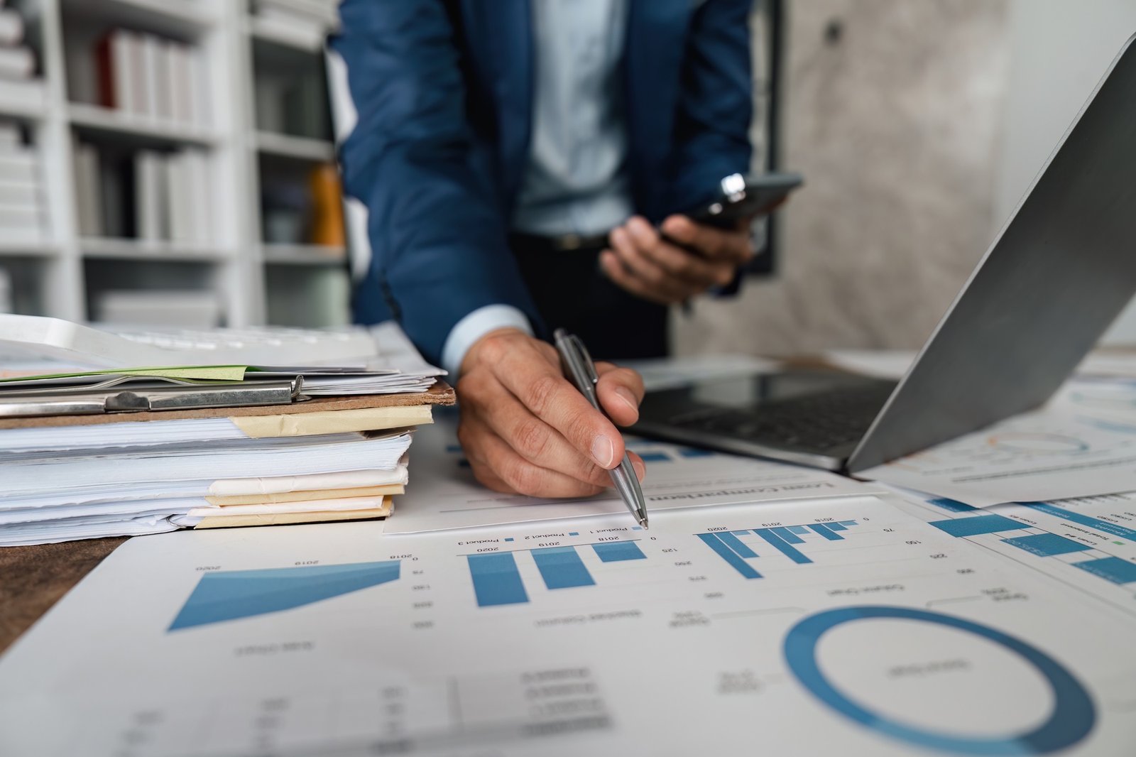 Businessman analyze company performance profits and growth, Marketing research report and income